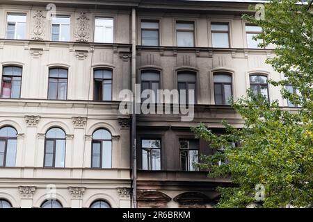 Wall of the house with burnt windows Stock Photo