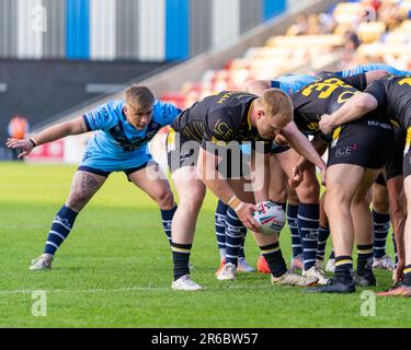 York, UK. 27th May, 2023. Rugby League Summer Bash: Featherstone Rovers v York RLFC. #14 James Cunningham, York RLFC feeds the ball into the scrum whi Stock Photo