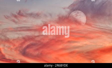 A Full Moon Is Rising In A Colorful Sunset Blue Daytime Sky High Resolution Stock Photo