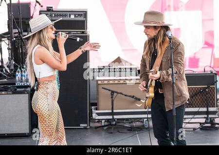 Lainey Wilson, left, and Lukas Nelson perform during the 2023 CMA Fest ...