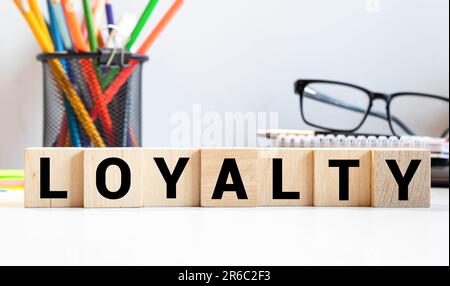 Loyalty Word In Wooden Cube Stock Photo
