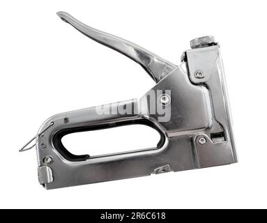 Industrial stapler for working with staples on a white background. Stapler with signs of wear and abrasions Stock Photo
