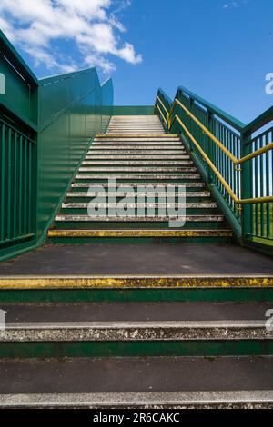 Steps leading to a railway footbridge, Magor, South Wales Stock Photo