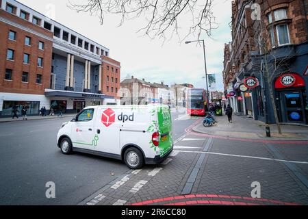London- March 01, 2023: A DPD Geopost delivery van on Streatham High Street street scene, a 1.8 mile street of retail shops in SW16 south west London Stock Photo