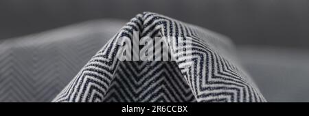 Stylish black and grey herringbone fabric texture background Stock Photo