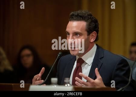 Washington, Vereinigte Staaten. 08th June, 2023. Zack Cooper, Ph.D., Associate Professor of Public Health and Associate Professor of Economics, Yale University, appears before a Senate Committee on Finance hearing to examine consolidation and corporate ownership in health care, focusing on trends and impacts on access, quality, and costs, in the Dirksen Senate Office Building in Washington, DC, Thursday, June 8, 2023. Credit: Rod Lamkey/CNP/dpa/Alamy Live News Stock Photo