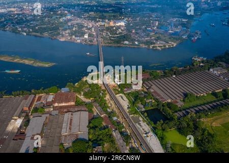 Aerial view of the Sultana Kamal Bridge also known as Demra Bridge and the Sitalakhya River at Demra in Dhaka, Bangladesh. Stock Photo