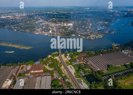 Aerial view of the Sultana Kamal Bridge also known as Demra Bridge and the Sitalakhya River at Demra in Dhaka, Bangladesh. Stock Photo