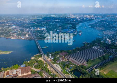 Aerial view of the Sultana Kamal Bridge also known as Demra Bridge and the Sitalakhya River at Demra in Dhaka, Bangladesh. Stock Photo