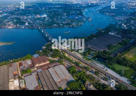 Aerial view of the Sultana Kamal Bridge also known as Demra Bridge and the Sitalakhya River at Demra in Dhaka, Bangladesh. Stock Photo