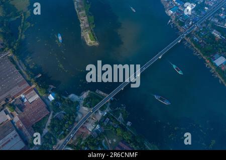 Aerial view of the Sultana Kamal Bridge also known as Demra Bridge and the Sitalakhya River at Demra in Dhaka, Bangladesh. Stock Photo