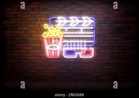 Glowing neon sign with popcorn bucket, clapper and glasses on brick wall Stock Photo