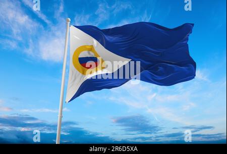 flag of Indo-Aryan ethnoreligious groups Chukchis at cloudy sky background, panoramic view. flag representing ethnic group or culture, regional author Stock Photo