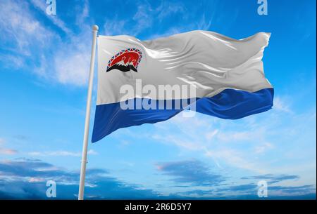 flag of Indo-Aryan ethnoreligious groups Itelmens at cloudy sky background, panoramic view. flag representing ethnic group or culture, regional author Stock Photo