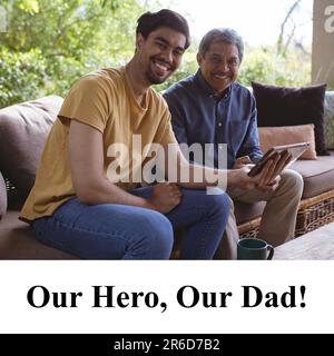 Composite of out hero, our dad text over biracial young son and senior father using tablet at home Stock Photo