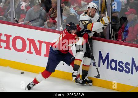 https://l450v.alamy.com/450v/2r6d88w/florida-panthers-center-colin-white-6-slams-vegas-golden-knights-center-ivan-barbashev-49-agains-the-board-during-the-second-period-of-game-3-of-the-nhl-hockey-stanley-cup-finals-thursday-june-8-2023-in-sunrise-fla-ap-photorebecca-blackwell-2r6d88w.jpg