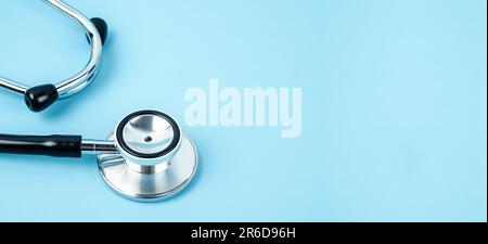 Medicine equipment stethoscope or phonendoscope isolated on trendy pastel blue background. Stock Photo