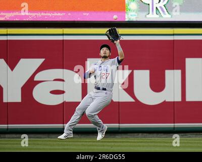 Seiya Suzuki of the Chicago Cubs makes a thumbs-up gesture on base after  hitting a double during the fourth inning of a baseball game against the  Los Angeles Angels at Angel Stadium