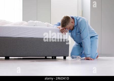 Dizzy Man With Low Blood Pressure. Vertigo Symptoms Stock Photo