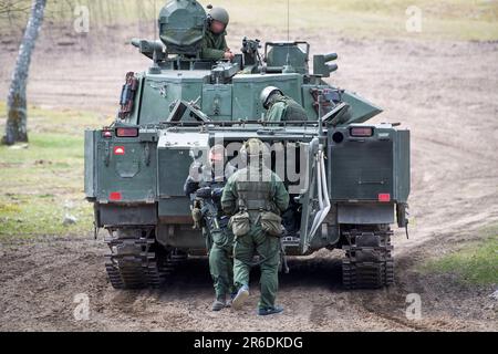 Swedish soldiers on Combat Vehicle 90 (CV90), In Swedish: Stridsfordon ...