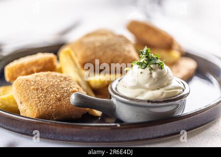 Fresh homemade mayonnaise as typical side of fried food such as chicken, cheese or chips. Stock Photo