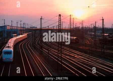 Track and ICE at sunset, Munich, Bavaria, Germany Stock Photo