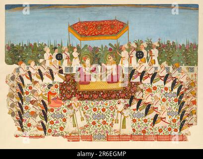 The setting is a huge, open marble terrace, set bedside a lush arbor-filled garden. A large summer white carpet is patterned with bold flowers in a trellis shape with metal derived lozenge-shaped images interspersed. The Kutch retinue of nobles sits on this carpet on the left side, while the Nagaur visitors sit on the right side. The chief Mahant of Kutch, dressed in salmon robes, joins the left side assembly. A multi-floral burgundy-based smaller carpet has been placed on top of this white carpet, and a smaller still yellow cotton dhurrie sits on top of the burgundy carpet. It is upon this th Stock Photo