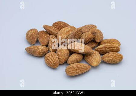 Fresh almonds nut isolated on white background Stock Photo