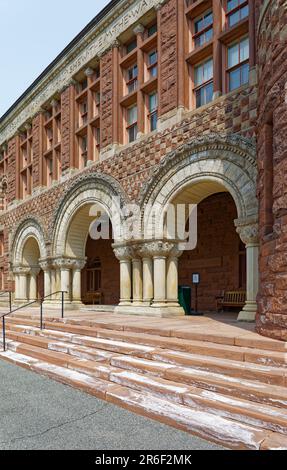 Henry H. Richardson designed Harvard Law School’s 1881 Austin Hall. The classroom building is styled in Richardsonian Romanesque, naturally. Stock Photo