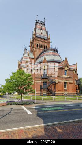 Memorial Hall honors Harvard men who died fighting for the Union in the U.S. Civil War. The Gothic-styled landmark holds a dining hall and a theater. Stock Photo