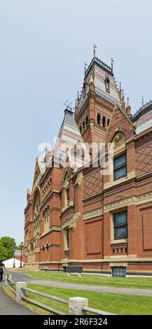 Memorial Hall honors Harvard men who died fighting for the Union in the U.S. Civil War. The Gothic-styled landmark holds a dining hall and a theater. Stock Photo