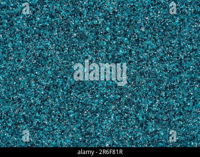 a close up of a teal colored carpet with small speckles. . Stock Photo
