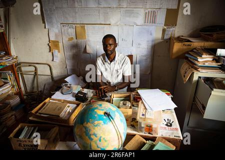 Headmaster in his office at a secondary school in rural Malawi Stock Photo