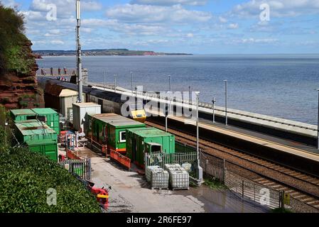 A high speed train passing through Dawlish station during building works to construct a new platform and footbridge in 2023. Stock Photo