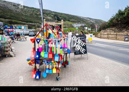 Beach plastic toys novelties on a sale on a display rack on the the roadside in Mawgan Porth in Cornwall in the UK. Stock Photo