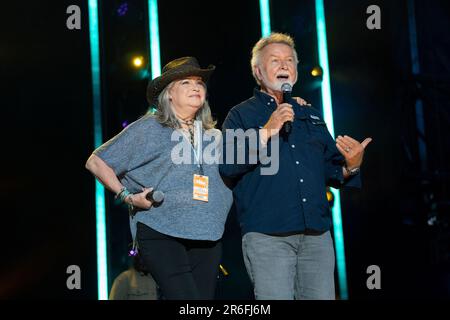 Lorianne Crook, left, and Charlie Chase are seen during the 2023 CMA