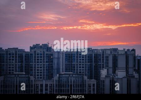 Modern residential buildings in Chengdu at sunset. Stock Photo