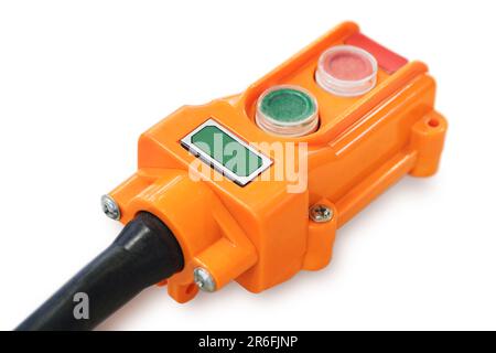 Orange industrial wired remote control with two buttons, isolated on white background Stock Photo