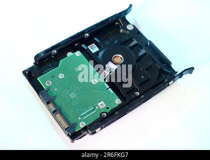 A PC hard drive removed from a computer Stock Photo