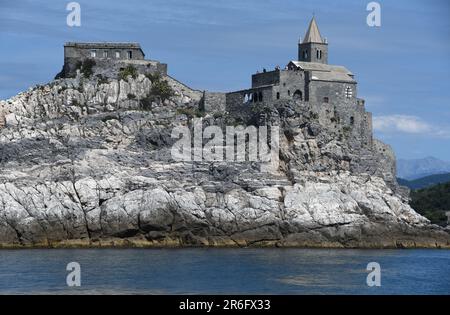 Italy - Porto Venere - May 8,  2022: The Romanesque church of San Pietro is a Catholic religious building in Porto Venere under the Doria Castle. Stock Photo