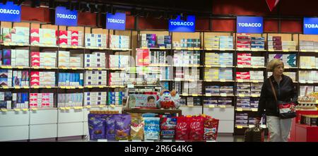 istanbul duty free tobacco prices A woman passenger at Istanbul Airport (Turkish: İstanbul Havalimanı) IATA:  IST, duty free shop, mainly cigarettes, tobacco, a few sweets Stock Photo