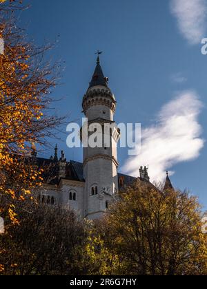 Schloss Neuschwanstein castle in sunset light and sunset orange colors. Stock Photo