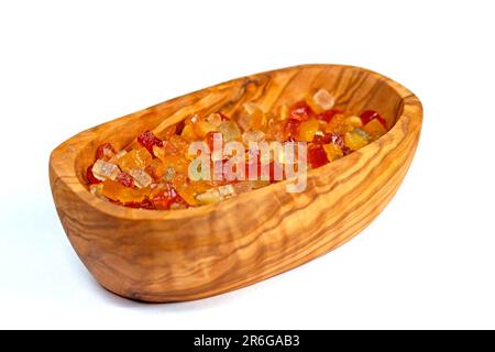 Candied lemon peels and candied orange peels in a wooden bowl Stock Photo