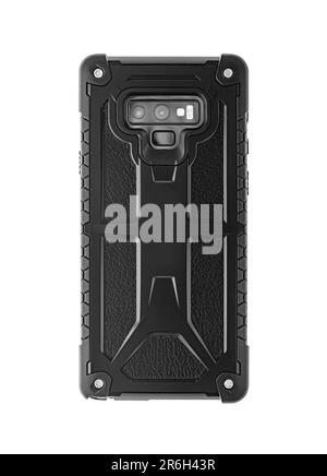 Black smartphone in a shockproof protective case isolated. Stock Photo