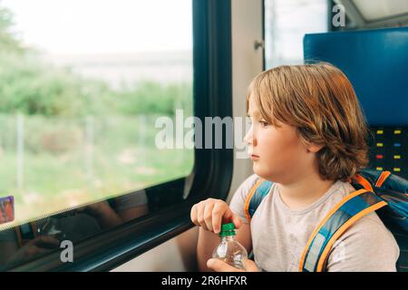 water bottle at a train window Stock Photo - Alamy