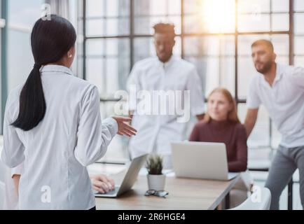 Businessmen and businesswomen talking during a meeting Stock Photo