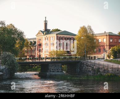 View of bridge over river in a city against sky Stock Photo