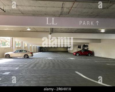 Empty floor of multi level parking garage. Stock Photo