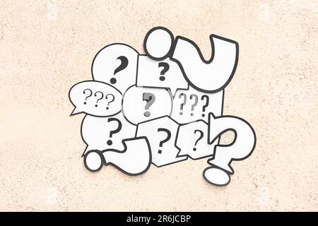 Speech bubbles with question marks on grunge background Stock Photo