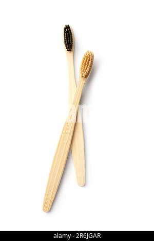 Different bamboo toothbrushes on white background Stock Photo - Alamy